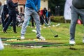 Golfer legs at golf tournament practice swing with golf club Royalty Free Stock Photo