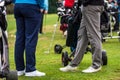 Golfer legs at golf tournament practice swing with golf club Royalty Free Stock Photo