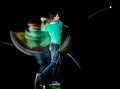 Golfer man golfing golf swing isolated black background multiple exposure