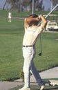 Golfer in mid-swing, Golf Retreat, Santa Clara, CA