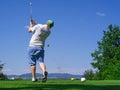 Golfer playing on golf course Royalty Free Stock Photo