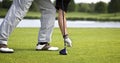 Golfer preparing for teeing off Royalty Free Stock Photo