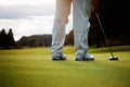 Golfer putting Royalty Free Stock Photo