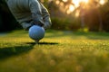 A golfer is putting a ball on the green Royalty Free Stock Photo