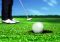 Golfer Putting the Ball into the Hole Royalty Free Stock Photo