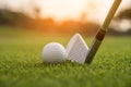 Golfer is putting golf ball on green grass at golf course for training to hole  with blur background a Royalty Free Stock Photo