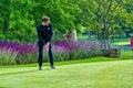 Singer shane filan on putting green