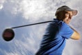 Golfer shooting a golf ball Royalty Free Stock Photo