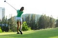 Golfer sport course golf ball fairway. People lifestyle woman playing game golf tee off Royalty Free Stock Photo