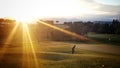 Golfer sunset Royalty Free Stock Photo