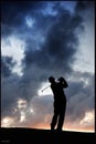 Golfer sunset wales Royalty Free Stock Photo