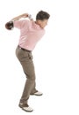 Golfer Swinging Golf Club Against White Background Royalty Free Stock Photo