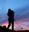 Golfer swings a driver