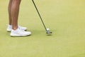 a golfer taking a shot on the green