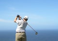 Golfer on the tee box Royalty Free Stock Photo