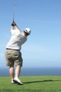 Golfer on the tee box Royalty Free Stock Photo