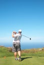Golfer on the tee box Royalty Free Stock Photo