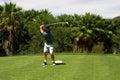 Golfer on the tee box. Royalty Free Stock Photo