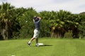 Golfer on the tee box. Royalty Free Stock Photo