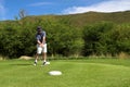 Golfer on the tee box. Royalty Free Stock Photo
