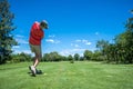 Golfer tee off Royalty Free Stock Photo