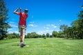 Golfer tee off Royalty Free Stock Photo