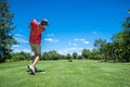 Golfer tee off Royalty Free Stock Photo