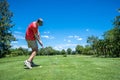 Golfer tee off Royalty Free Stock Photo