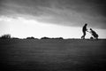 Golfer under moody sky