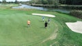 Golfers Enjoying The Day