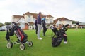 Golfers and golf bags at golf club