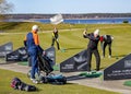 Golfers are playing golf on the banks of the beautiful Kisezers lake