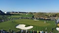 Golfers putting on green Royalty Free Stock Photo