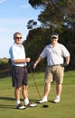 Golfers on the tee box Royalty Free Stock Photo