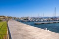 Golfo Aranci, Sardinia, Italy - Panoramic view of Golfo Aranci yacht port - Marina di Golfo Aranci - with seashore park boulevard Royalty Free Stock Photo