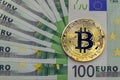 Golg coins bitcoin on euro banknotes