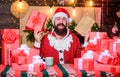 By golly, be jolly. bearded santa deliver gifts by address. winter shopping sales. Writing wish list. bearded man santa