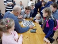 GOMEL, BELARUS - DECEMBER 29, 2019: Checkers chess competition among girls and boys Royalty Free Stock Photo