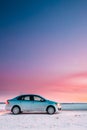 Volkswagen Polo Car Sedan Parking On A Roadside Of Country Road On A Background Of Dramatic Sunset Sky At Winter Season Royalty Free Stock Photo