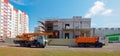 GOMEL, BELARUS - June 4, 2020: construction of a shopping center by a team of builders