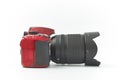 GOMEL, Belarus - MARCH 20, 2018: NIKON 3200 camera in red on a white background. Royalty Free Stock Photo