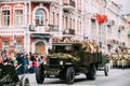 Gomel, Belarus. Re-enactos Dressed As Russian Soviet Soldiers Of World War II Sitting In Truck ZIS-5V And Taking Part In