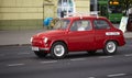 GOMEL, BELARUS - May 17, 2018: old red small retro car on the city street.