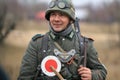 Gomel, Belarus - November 26, 2017: Re-enactors Dressed As German Soldiers In WW II Are Fighting With A Cannon. Celebration Of 74