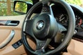 GOMEL, Republic of Belarus, June 09, 2015: leather light interior of the car steering wheel