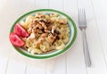 Gomiti Pasta with fried chicken and onion pieces with tomato and Royalty Free Stock Photo