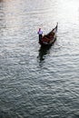 Gondalier on a venetian Canal, Venice, Italy Royalty Free Stock Photo