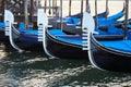 Gondola boats moored in Grand Canal in Venice, Italy Royalty Free Stock Photo