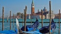 Gondola boats parking. Gondola moored, Venice, Italy. Italian gondola paddle boats docked in Venice, Veneto, Italy.