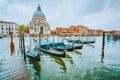 Gondola on Canal Grande with Basilica di Santa Maria della Salute in the background, Venice, Italy Royalty Free Stock Photo